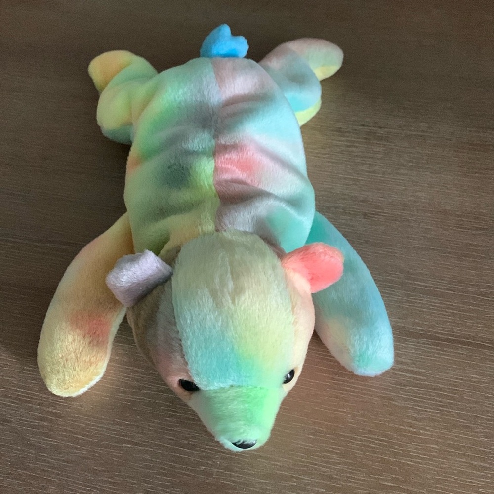 Stuffed multicolor polar bear toy